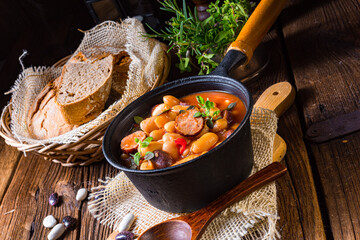 Delicious bean stew with sausage and potato