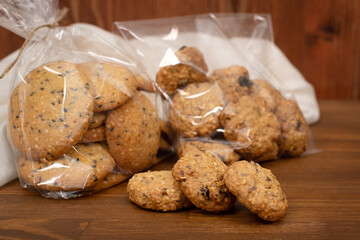 oatmeal cookies in packing on a wooden table. Close-up. background