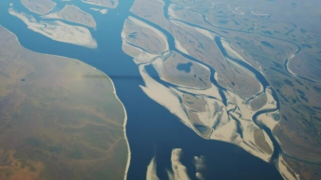 Aerial top view on Lena river, one of largest rivers in the world, Russia, 4k