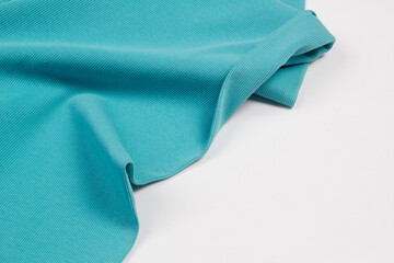 Multicolored fabrics folded top view . Multi-colored textile