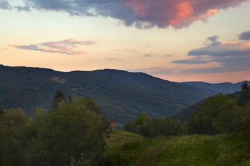 Naklejka na ściany i meble Cloudy sky in the Slovenian mountains