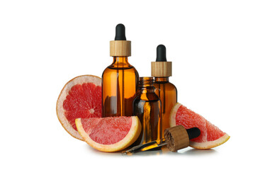 Dropper bottles with oil and grapefruit isolated on white background