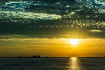 Obraz premium Grado and its lagoon at sunset. Glimpses of tranquility.