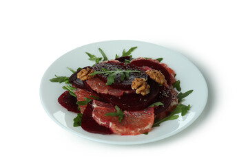 Plate with tasty beet salad isolated on white background