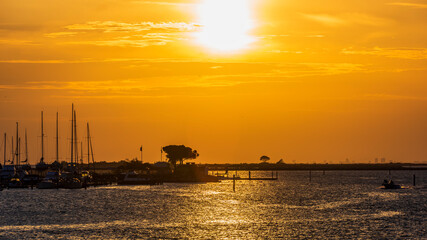 Grado and its lagoon at sunset. Glimpses of tranquility.