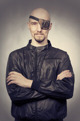 Young man in style of steampunk icon with eye patch