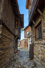 Fototapeta na wymiar Old wooden houses in the old town of Nessebar, Bulgaria