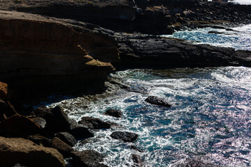 Calm ocean in the morning. ocean shore with stones