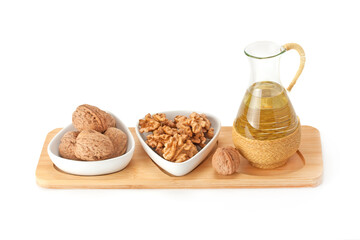 Walnuts and oils in bottle .