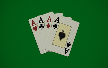 four aces on a green background. casino concept, combination of four