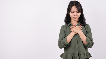 a Christian woman praying humbly isolated white background