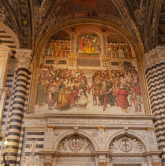 Fototapeta na wymiar Frescoes in Piccolomini Library in Siena Cathedral