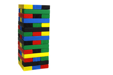 Fototapeta na wymiar Game tower of colored wooden blocks, bricks isolated on a white background