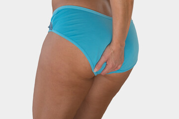 Woman with health problems. Hemorrhoids and intestinal issues.