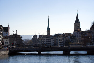 Old town of Zurich with churches Fraum&uuml;nster (German), translation is Women's Minster, and St. Peter. Photo taken October 24th, 2020, Zurich, Switzerland.