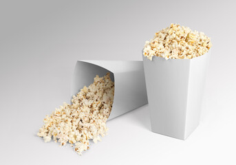Plain white two popcorn boxes filled with popcorn - obrazy, fototapety, plakaty