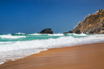 Beautiful sandy beach in Praia da Adraga, Portugal