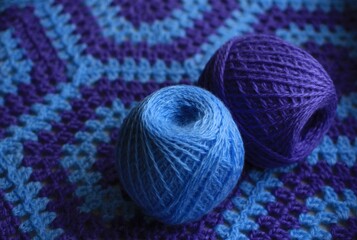 Plaid crocheted from blue and lilac threads