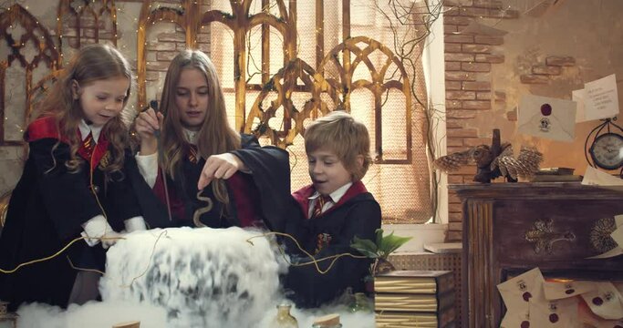 Older student is teaching little ones how to brew a potion in a steaming pot, 4k
