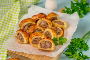 Puff pastry mini sausage rolls with ground beef - 422943099