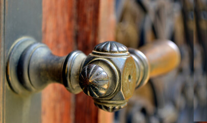 Old brass ornamental door handle 