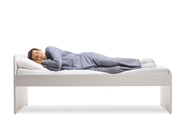 Full length shot of a man sleeping peacfully in a single bed