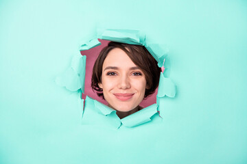 Photo of nice optimistic brunette lady broke wall isolated on bright teal color background