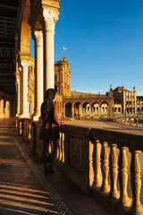 Young and sexy woman tourist in Spain Square of Seville, place of Star Wars