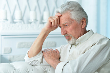 Close up portrait of thoughtful senior man