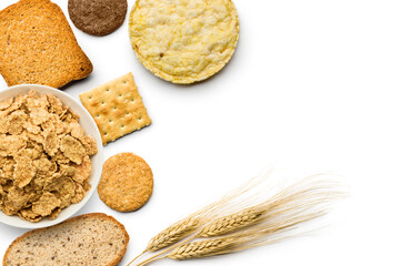 variety of bakery and wholemeal products on white background
