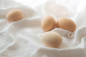 Chicken eggs on white background, selective focus. Happy easter background.