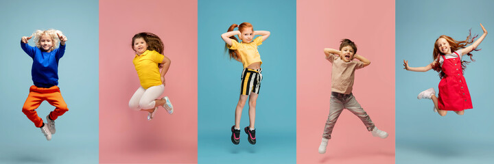 Young and happy kids gesturing isolated on multicolored studio background. Human emotions, facial expression concept