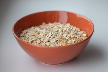 oatmeal in a brown cup close-up