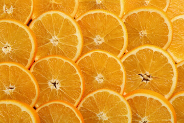 Slices of delicious oranges as background, closeup