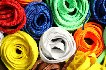 Colorful shoelaces as background, closeup. Stylish accessory