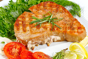 Tuna steak cooked on the electric grill. tunafish served on a plate with fresh herbs and vegetables. healthy nutritious, Healthy Eating for a Healthy Weight