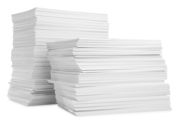 Stacks of paper sheets isolated on white