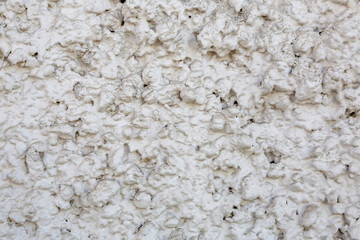 Original textured surface of of a natural coarse stone