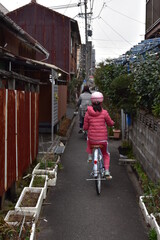 Fototapeta na wymiar cycling through narrow passages