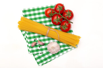 Composition of pasta ingredients isolated on white background, top view
