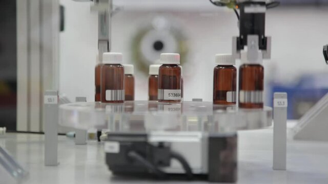 Packing Medicine Drugs Bottles in Pharmaceutical Factory Production