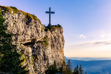 Summer beautiful mountain view. France, croix du Novolet. A big cross on top of the mountain.