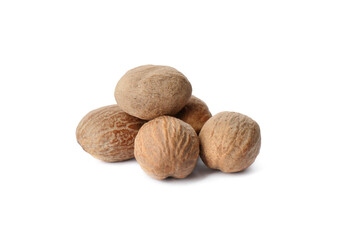 Heap of nutmeg seeds on white background