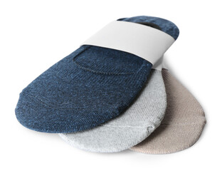 New pairs of soft cotton socks on white background