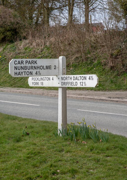 Three way directional signpost