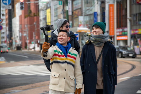 Young People Making Video with Gimbal