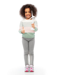 happy african american girl with toy wind turbine