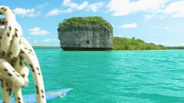 Traditional pirogue tour in the scenic Upi bay, Isle of Pines. New Caledonia