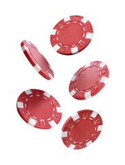 Red casino chips falling on white background