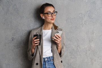 Fototapeta premium Attractive confident young woman in basic jacket
